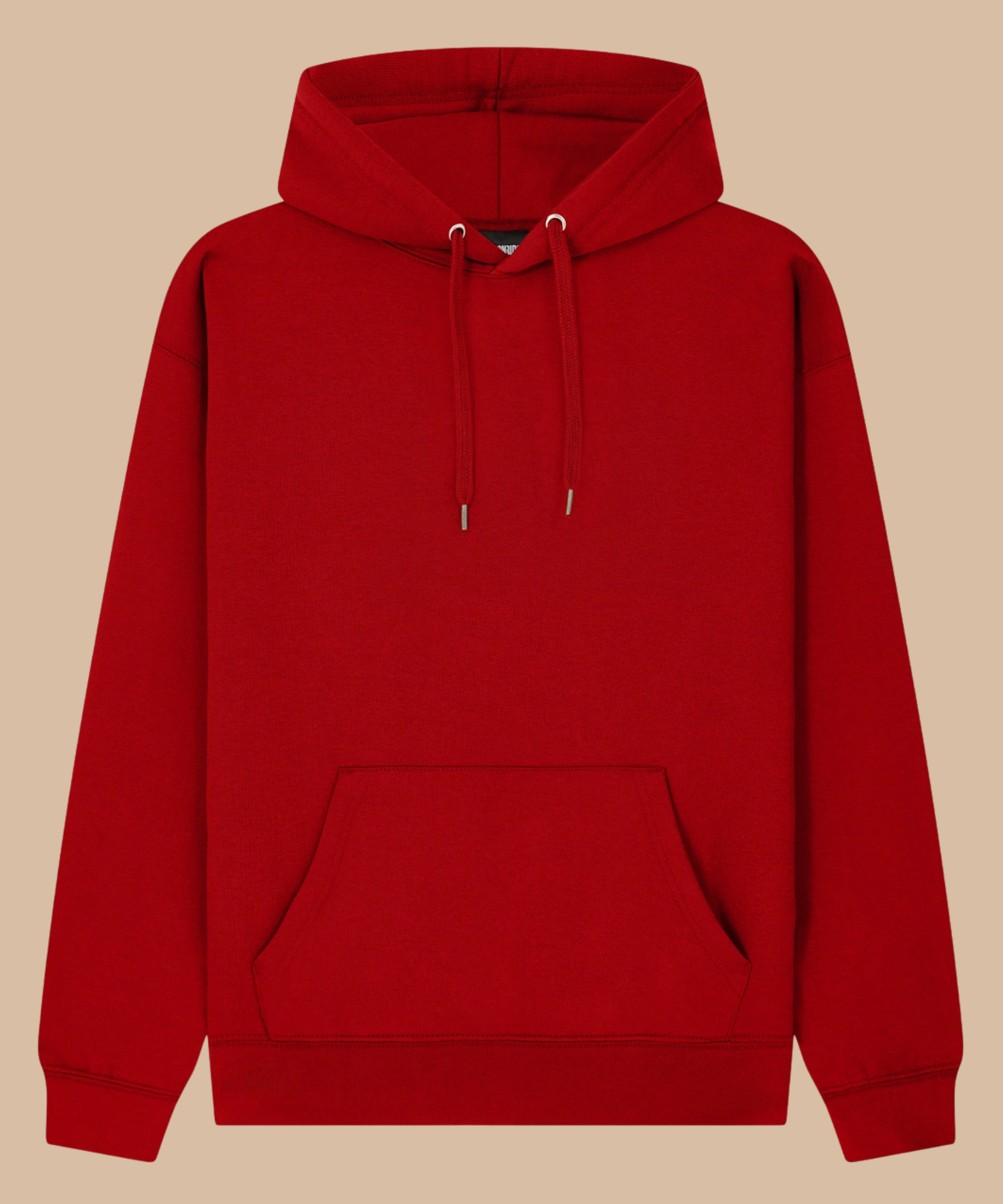A solid red pullover hoodie with matching drawstrings and a front kangaroo pocket, displayed against a solid beige background. Pathfinder Printworks hand print hoodies for clubs, teams and businesses. Based in South Wales.