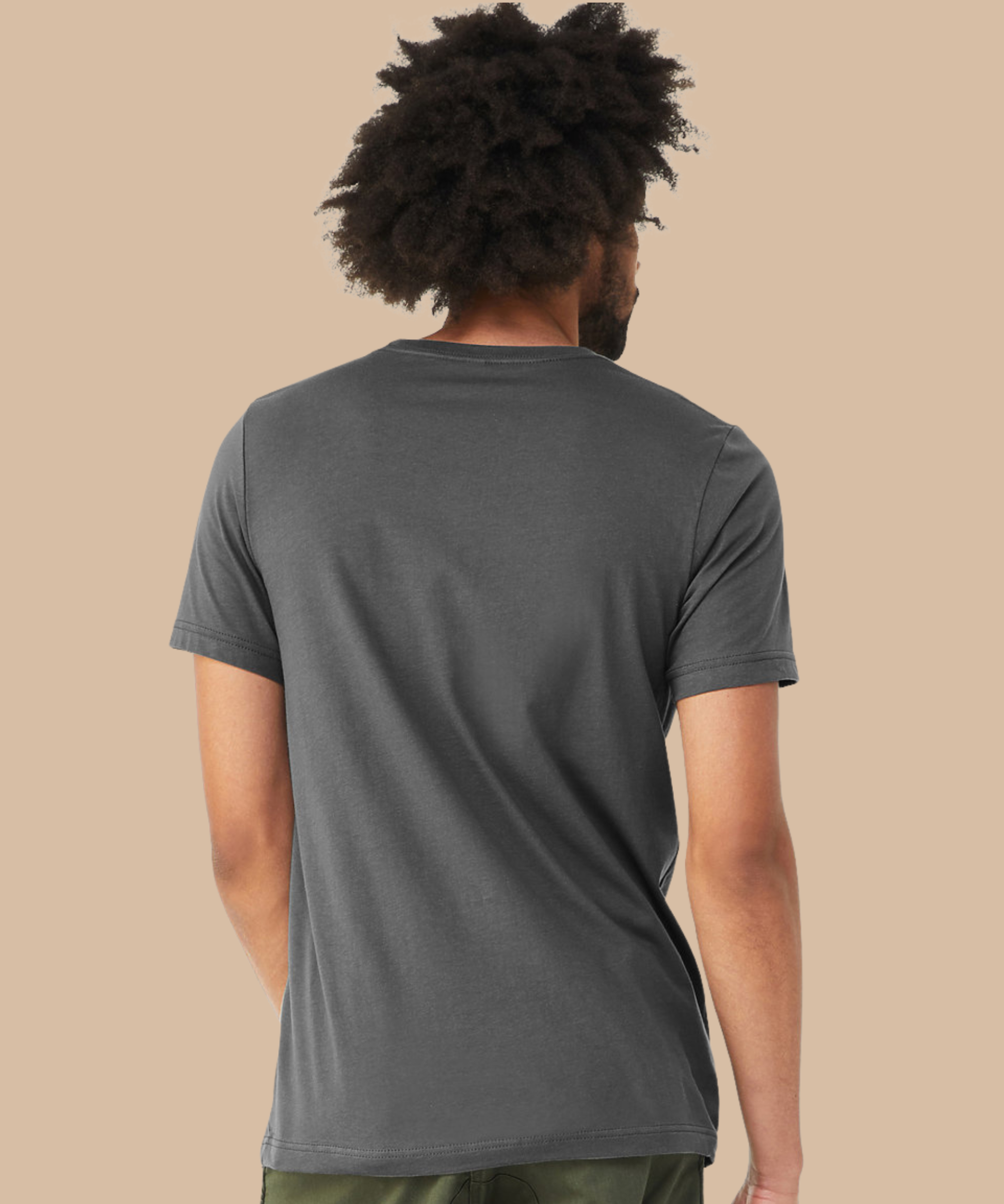 Person wearing a grey t-shirt on a beige background. Standard stock for Pathfinder Printworks hand printing services. Based in South Wales.