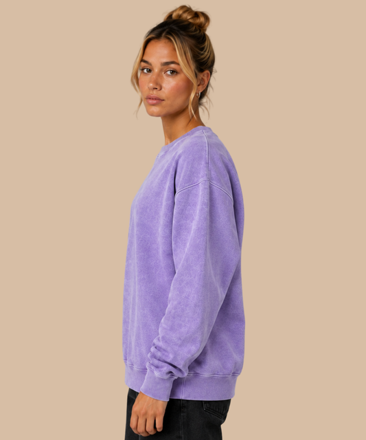 Side view of lilac vintage relaxed sweatshirt showing the dropped shoulder, loose silhouette and washed finish. Printing services from Pathfinder Printworks, based in South Wales.