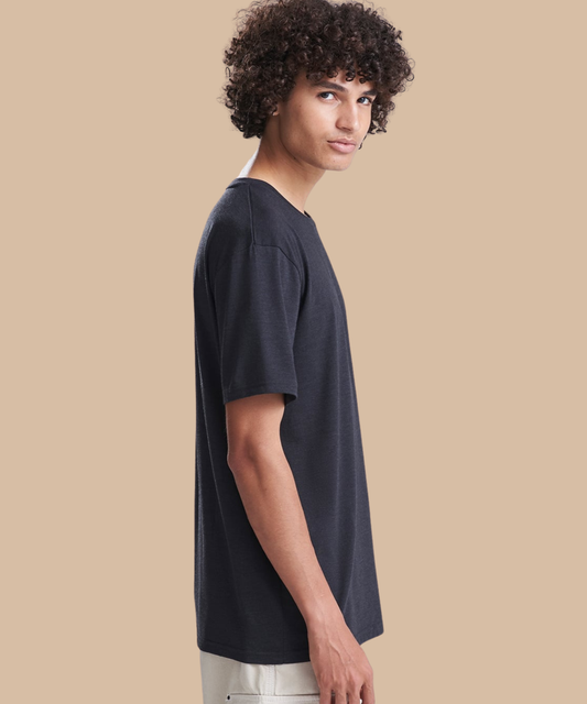 Side view of a man wearing a black t-shirt. Standard stock for Pathfinder Printworks hand printing services. Based in South Wales.