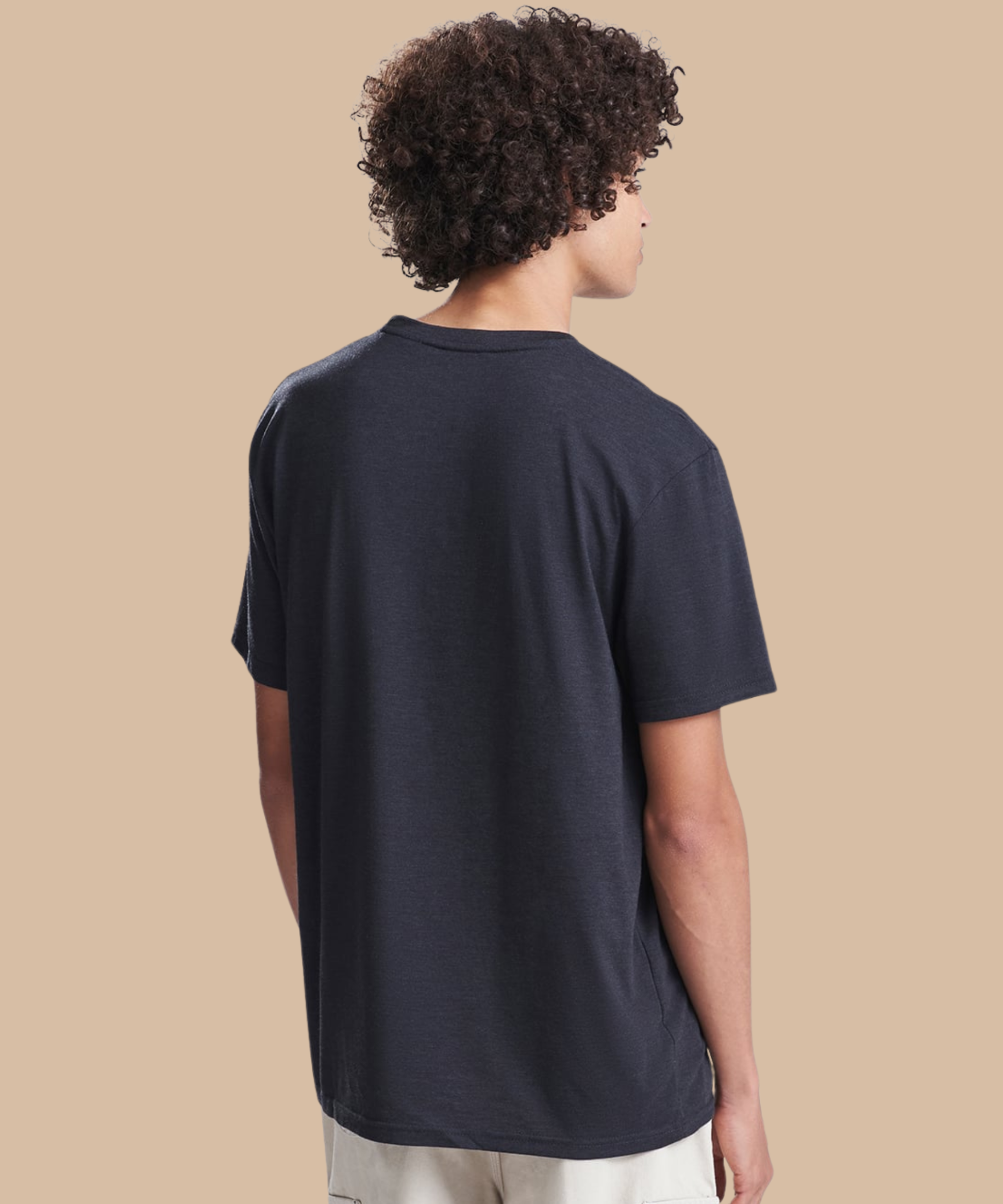 The back of a man wearing a black t-shirt. Standard stock for Pathfinder Printworks hand printing services. Based in South Wales.